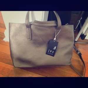 Leather satchel bag in metallic color